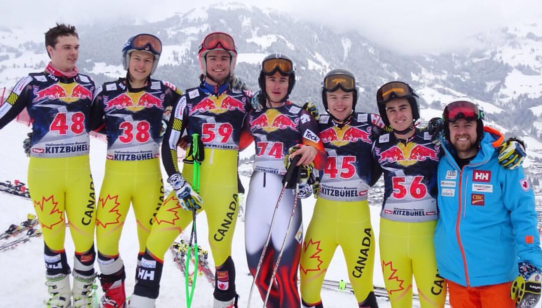 seven canadian ski racers wearing race suits in kitzbuhel austria