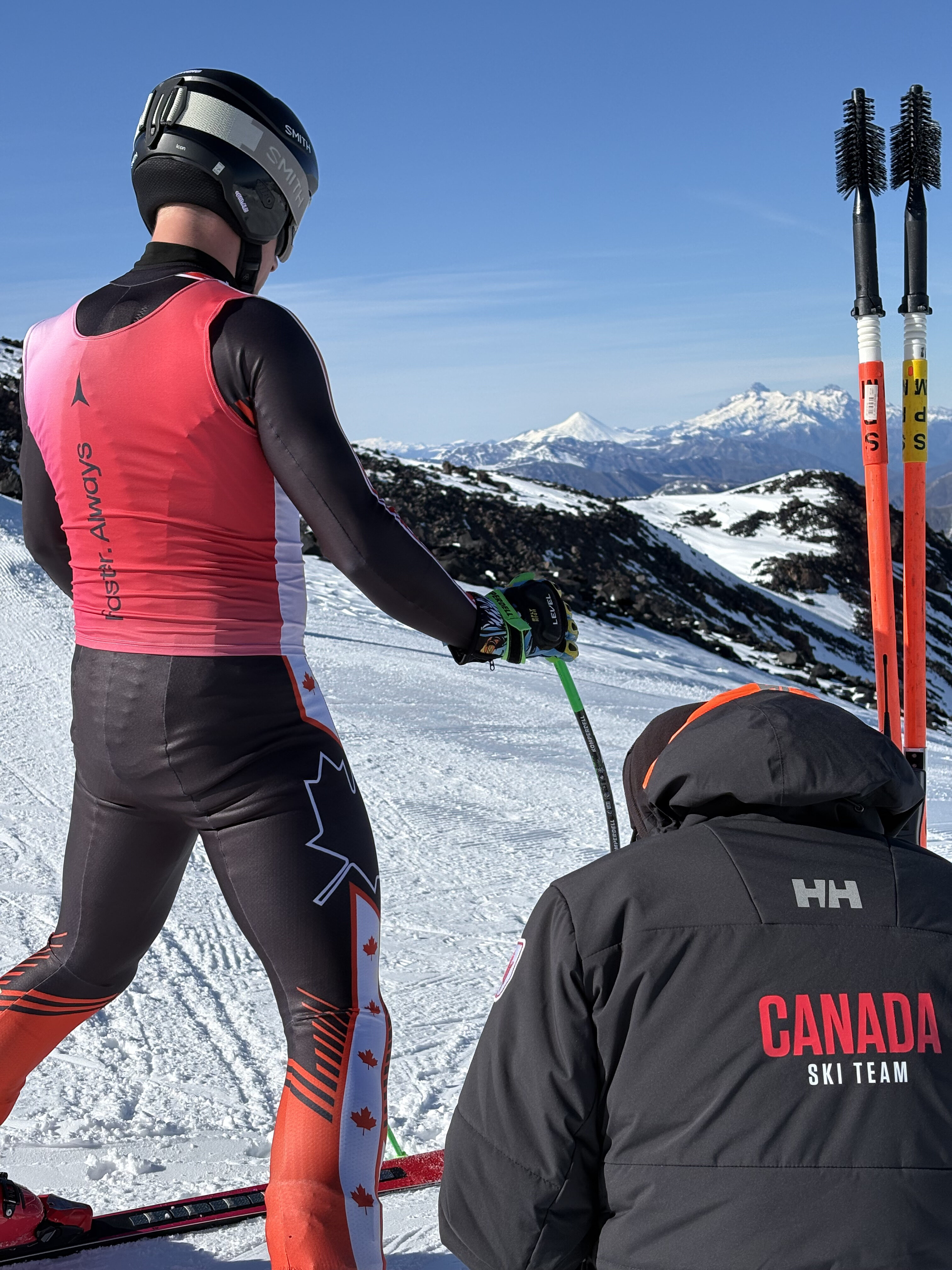 Standing in the start gate of the DH course.